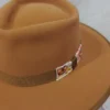 WhatsApp Image 2026-10-15 at 4.29.03 PM Sombrero mostaza lana de borrego bordado de pensamientos tonos mostazas