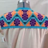 vestido punto de cruz melon con tejido fino turqueza