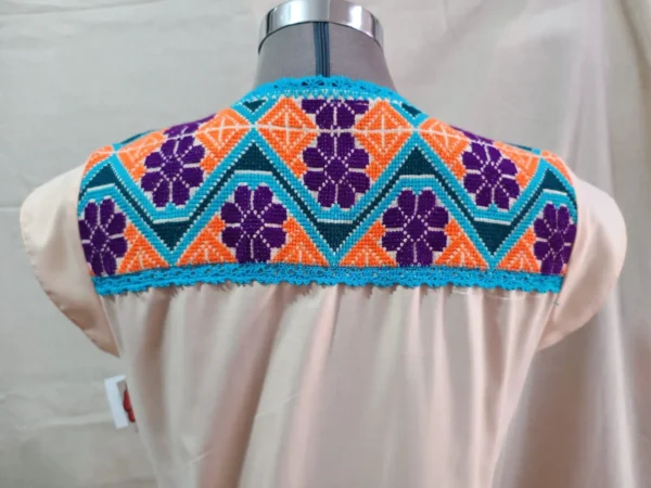 vestido punto de cruz melon con tejido fino turqueza