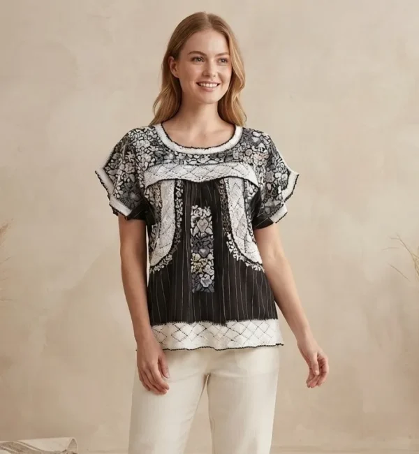 Blusa de lino rayado con bordado de pensamientos en seda