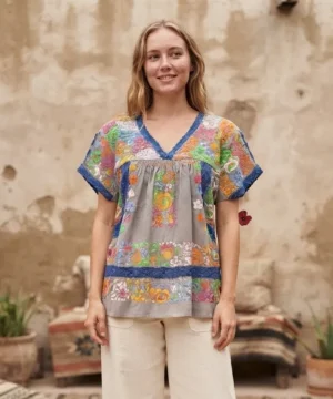 Blusa de lino con bordado multicolor y detalles artesanales