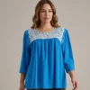 Blusa sencilla turquesa con plata
