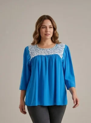 WhatsApp Image 2026-10-12 at 6.07.43 PM Blusa sencilla turquesa con plata