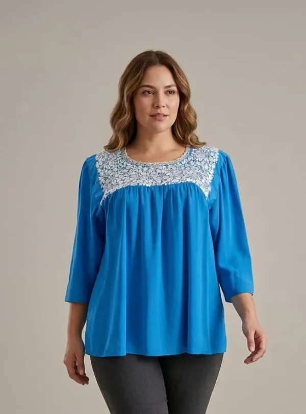 Blusa sencilla turquesa con plata