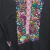 WhatsApp Image 2026-10-12 at 6.11.24 PM Vestido negro con bordado y tejido enfrente