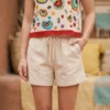 Conjunto de short y blusa tela hueso