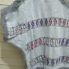WhatsApp Image 2026-10-12 at 6.22.57 PM Blusa telar azul cielo deshilado moños tejido gris