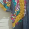 WhatsApp Image 2026-10-12 at 6.41.46 PM Blusa tela mezclilla bordado colores tejido mostaza