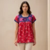 Blusa roja estampada tejido azul rey