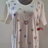 Playera hueso con tonos pasteles