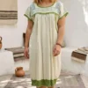 Vestido telar verde tierno deshilado moñitos tejido verde seco