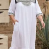 Vestido blanco modelo pechera ,holán y bolsas