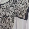 Vestido blanco modelo pechera ,holán y bolsas