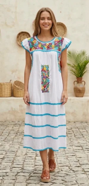 WhatsApp Image 2026-10-14 at 12.51.22 PM Vestido blanco multicolor bordado margaritas ,tejido turquesa