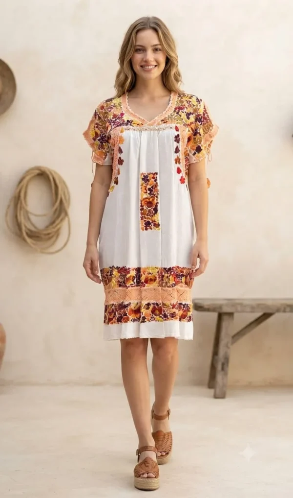 Vestido tela hueso bordado pensamientos tonos rojos y mostazas tejido melón