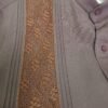 WhatsApp Image 2026-10-14 at 5.29.52 PM Guayabera café cuello mao con una randa de samilla
