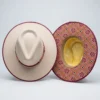 WhatsApp Image 2026-10-15 at 9.17.51 PM Sombrero lana de borrego color hueso bordado punto de cruz