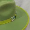 WhatsApp Image 2026-10-15 at 9.21.26 PM3 Sombrero lana de borrego verde tierno bordado punto de cruz tonos verde