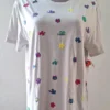 b10 Playera gris plata con bordado de colores