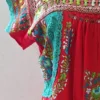 Blusa tela roja bordado con tonos verdes