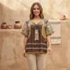 Blusa tela café con deshilado danzantes trabajo arriba