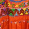 Blusa tela naranja de pirámides