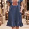 Vestido marino con bordado cobre punto de cruz