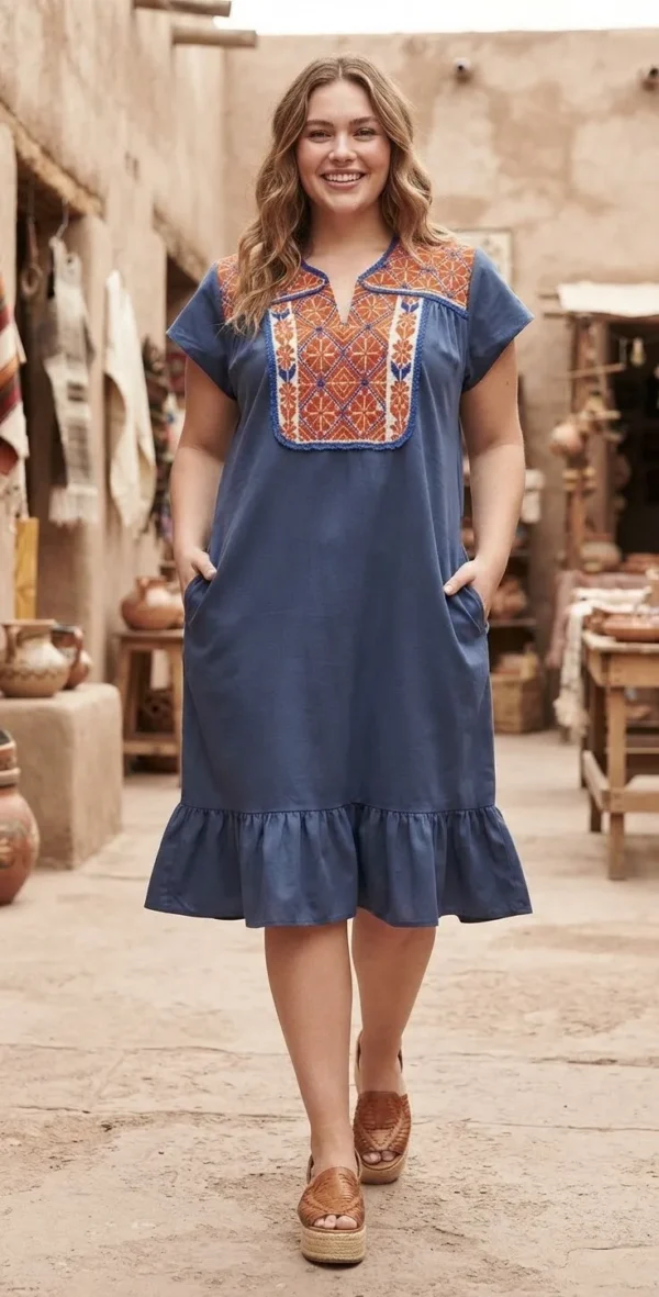Vestido marino con bordado cobre punto de cruz