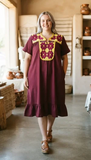 Vestido tela vino con bordado punto de cruz