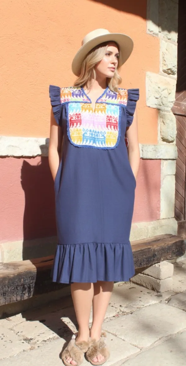 Vestido bordado en punto de cruz