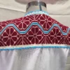 Vestido corto bordado en punto de cruz